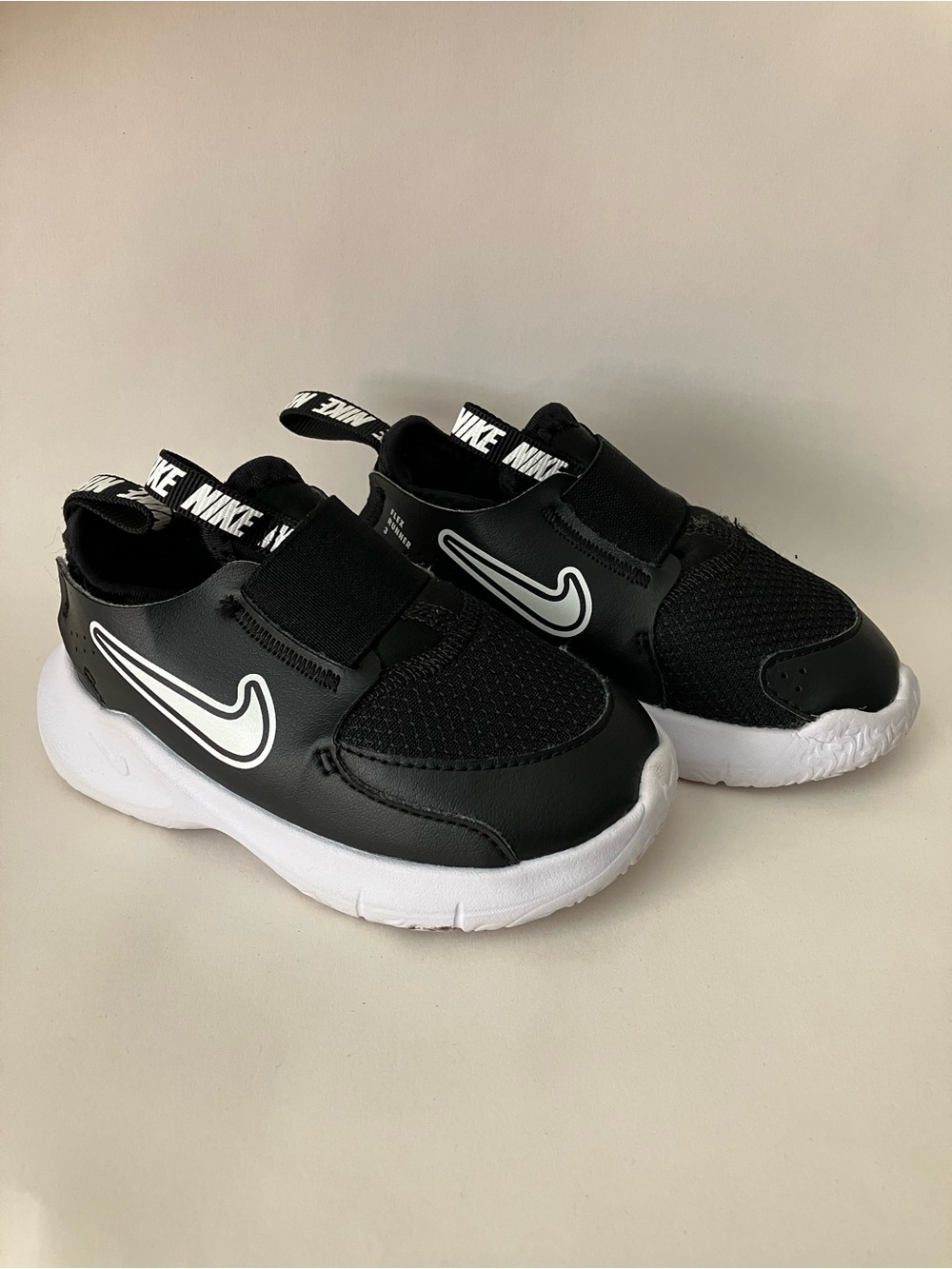 Nike Kids Black and White Slip-On Sneakers with Elastic Strap